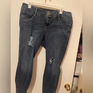 Torrid dark washed jeans with minimal distressing. 22r